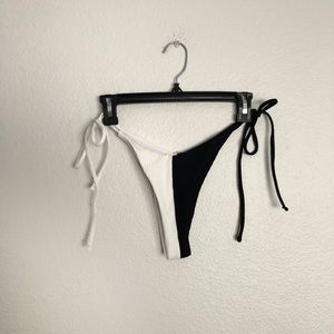 Black and white color block side tie cheeky bikini bottoms